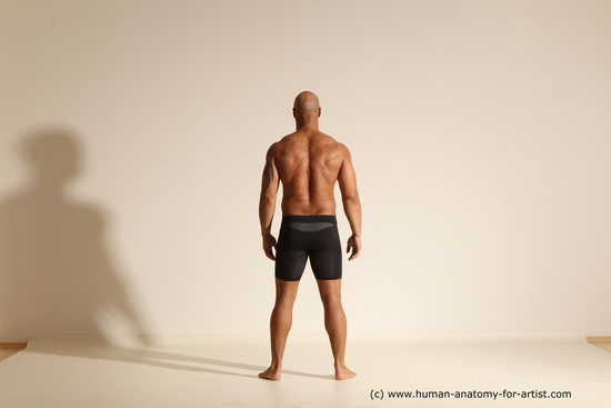 Underwear Gymnastic poses Man Black Muscular Bald Dancing Dynamic poses Academic