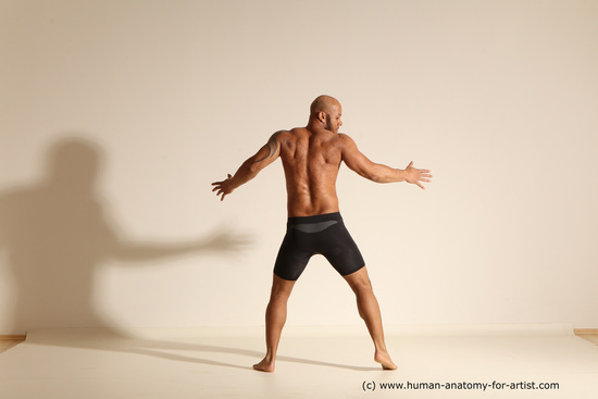 Underwear Gymnastic poses Man Black Muscular Bald Dancing Dynamic poses Academic