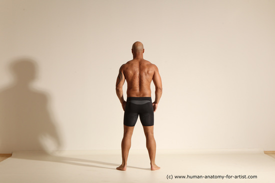 Underwear Gymnastic poses Man Black Muscular Bald Dancing Dynamic poses Academic