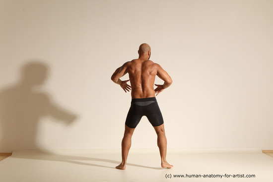 Underwear Gymnastic poses Man Black Muscular Bald Dancing Dynamic poses Academic