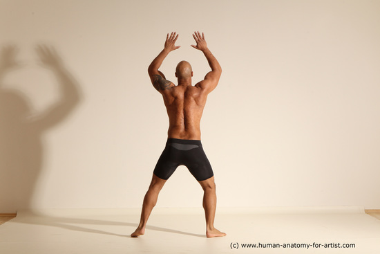 Underwear Gymnastic poses Man Black Muscular Bald Dancing Dynamic poses Academic