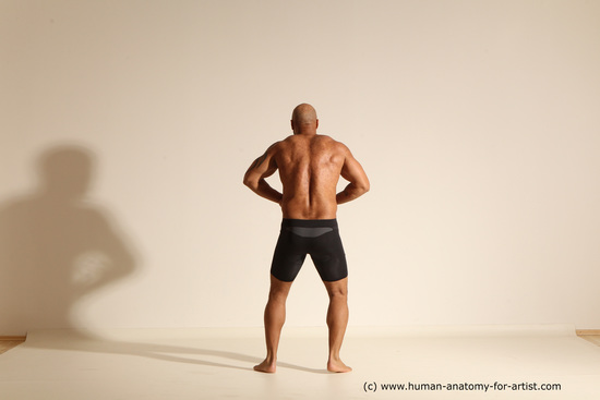 Underwear Gymnastic poses Man Black Muscular Bald Dancing Dynamic poses Academic