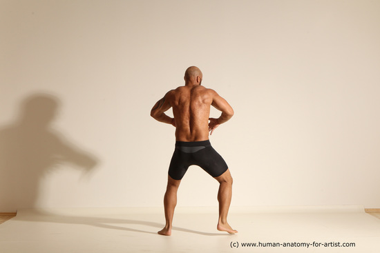 Underwear Gymnastic poses Man Black Muscular Bald Dancing Dynamic poses Academic