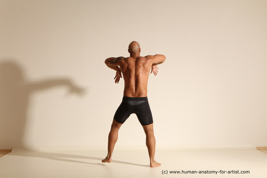 Underwear Gymnastic poses Man Black Muscular Bald Dancing Dynamic poses Academic