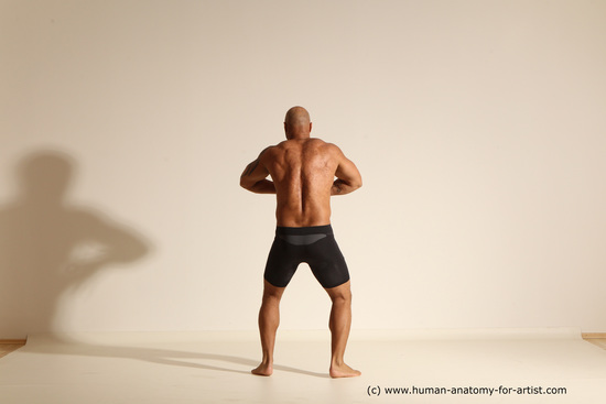 Underwear Gymnastic poses Man Black Muscular Bald Dancing Dynamic poses Academic