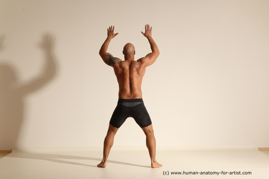 Underwear Gymnastic poses Man Black Muscular Bald Dancing Dynamic poses Academic