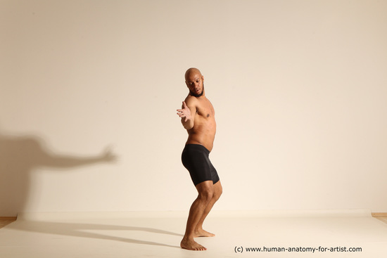 Underwear Gymnastic poses Man Black Muscular Bald Dancing Dynamic poses Academic