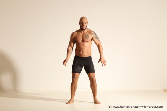 Underwear Gymnastic poses Man Black Muscular Bald Dancing Dynamic poses Academic