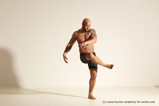 Underwear Gymnastic poses Man Black Muscular Bald Dancing Dynamic poses Academic