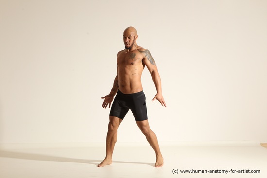 Underwear Gymnastic poses Man Black Muscular Bald Dancing Dynamic poses Academic