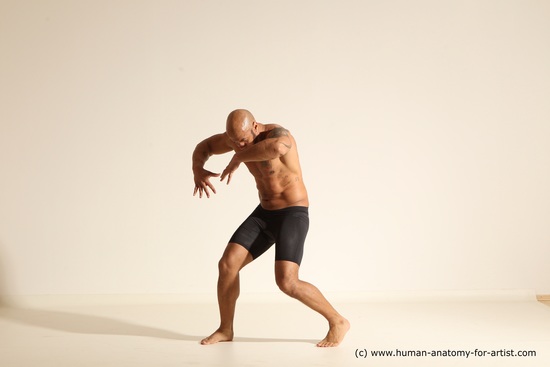 Underwear Gymnastic poses Man Black Muscular Bald Dancing Dynamic poses Academic