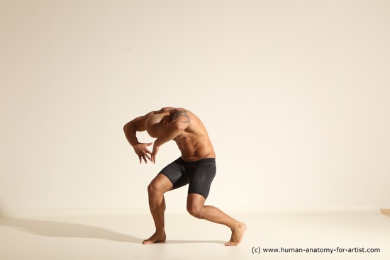 Underwear Gymnastic poses Man Black Muscular Bald Dancing Dynamic poses Academic