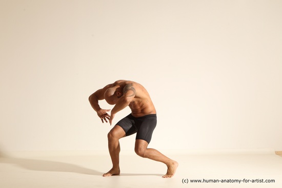 Underwear Gymnastic poses Man Black Muscular Bald Dancing Dynamic poses Academic