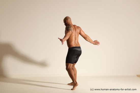 Underwear Gymnastic poses Man Black Muscular Bald Dancing Dynamic poses Academic