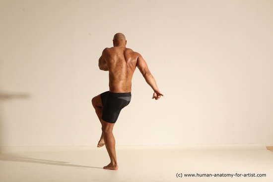 Underwear Gymnastic poses Man Black Muscular Bald Dancing Dynamic poses Academic