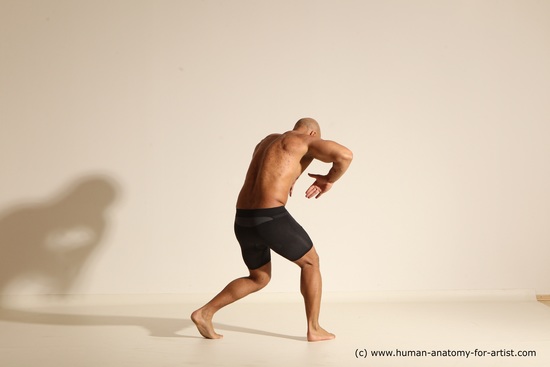 Underwear Gymnastic poses Man Black Muscular Bald Dancing Dynamic poses Academic