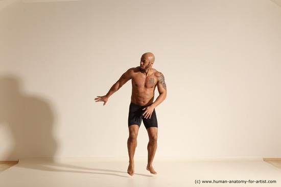 Underwear Gymnastic poses Man Black Muscular Bald Dancing Dynamic poses Academic