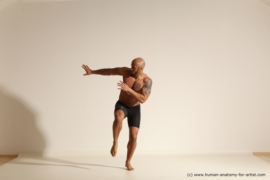 Underwear Gymnastic poses Man Black Muscular Bald Dancing Dynamic poses Academic