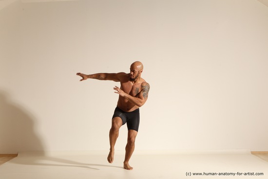 Underwear Gymnastic poses Man Black Muscular Bald Dancing Dynamic poses Academic