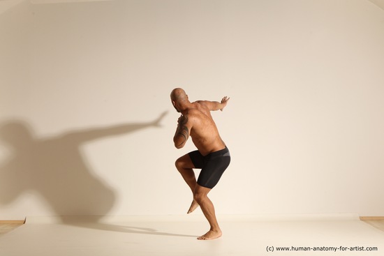 Underwear Gymnastic poses Man Black Muscular Bald Dancing Dynamic poses Academic