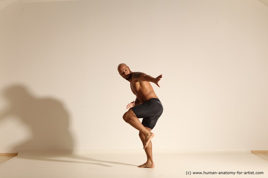 Underwear Gymnastic poses Man Black Muscular Bald Dancing Dynamic poses Academic