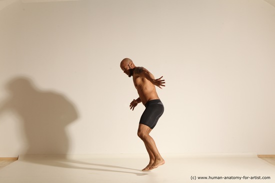 Underwear Gymnastic poses Man Black Muscular Bald Dancing Dynamic poses Academic