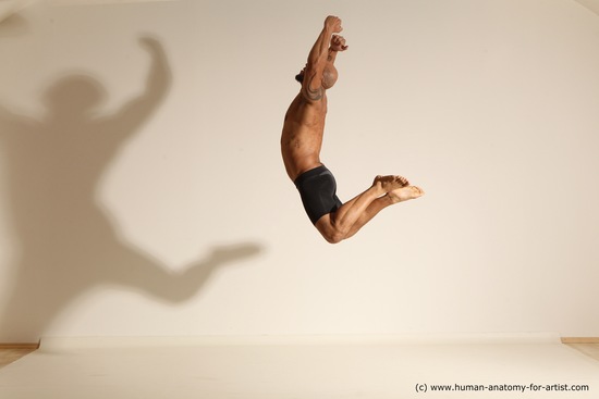 Underwear Gymnastic poses Man Black Muscular Bald Dancing Dynamic poses Academic