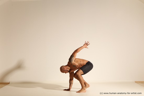 Underwear Gymnastic poses Man Black Muscular Bald Dancing Dynamic poses Academic