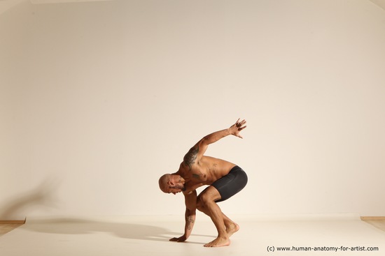 Underwear Gymnastic poses Man Black Muscular Bald Dancing Dynamic poses Academic