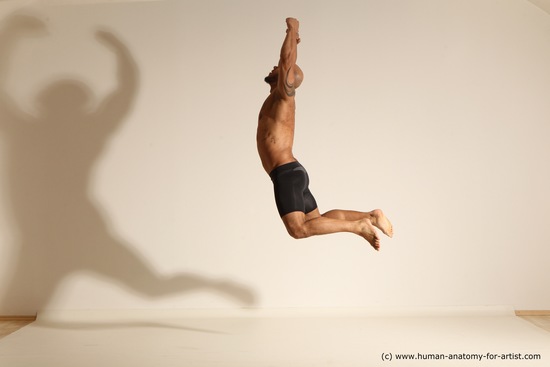 Underwear Gymnastic poses Man Black Muscular Bald Dancing Dynamic poses Academic