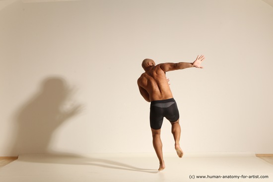 Underwear Gymnastic poses Man Black Muscular Bald Dancing Dynamic poses Academic