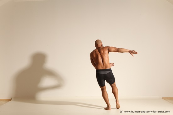 Underwear Gymnastic poses Man Black Muscular Bald Dancing Dynamic poses Academic