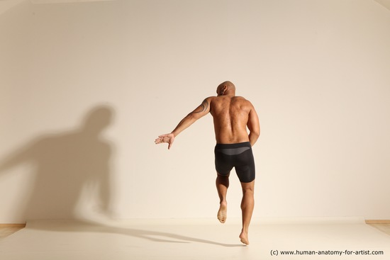 Underwear Gymnastic poses Man Black Muscular Bald Dancing Dynamic poses Academic