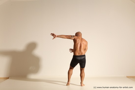 Underwear Gymnastic poses Man Black Muscular Bald Dancing Dynamic poses Academic