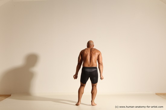 Underwear Gymnastic poses Man Black Muscular Bald Dancing Dynamic poses Academic