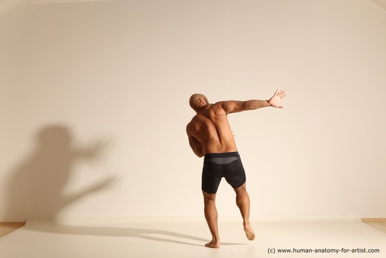 Underwear Gymnastic poses Man Black Muscular Bald Dancing Dynamic poses Academic