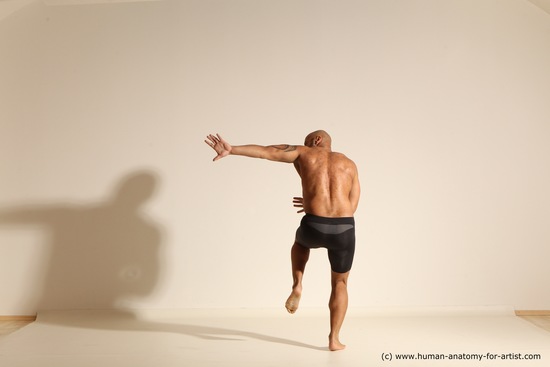 Underwear Gymnastic poses Man Black Muscular Bald Dancing Dynamic poses Academic