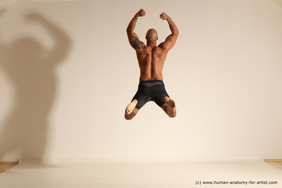 Underwear Gymnastic poses Man Black Muscular Bald Dancing Dynamic poses Academic