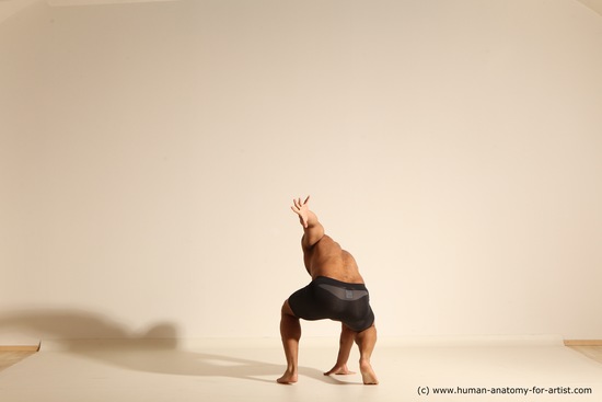 Underwear Gymnastic poses Man Black Muscular Bald Dancing Dynamic poses Academic