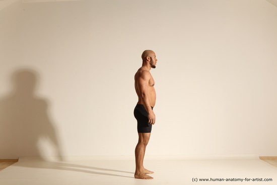 Underwear Gymnastic poses Man Black Muscular Bald Dancing Dynamic poses Academic