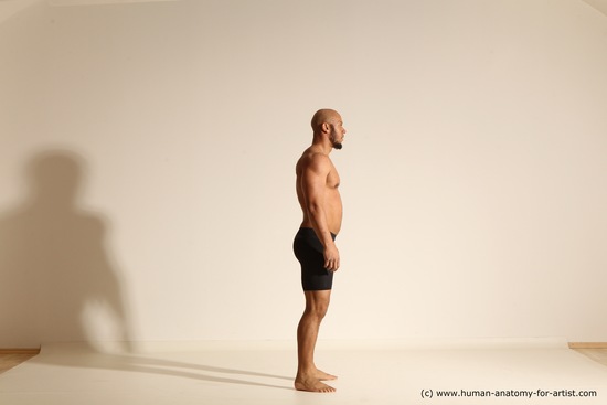 Underwear Gymnastic poses Man Black Muscular Bald Dancing Dynamic poses Academic