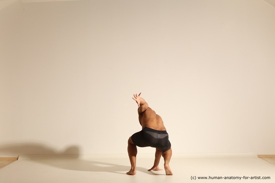 Underwear Gymnastic poses Man Black Muscular Bald Dancing Dynamic poses Academic