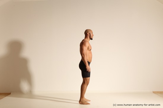 Underwear Gymnastic poses Man Black Muscular Bald Dancing Dynamic poses Academic