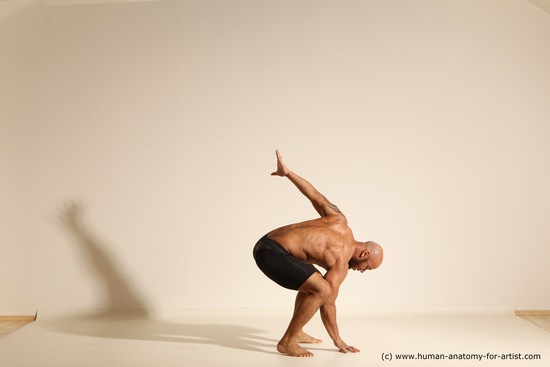 Underwear Gymnastic poses Man Black Muscular Bald Dancing Dynamic poses Academic