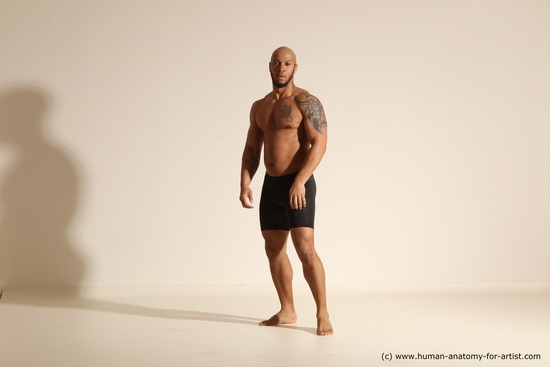 Underwear Gymnastic poses Man Black Muscular Bald Dancing Dynamic poses Academic