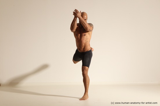 Underwear Gymnastic poses Man Black Muscular Bald Dancing Dynamic poses Academic