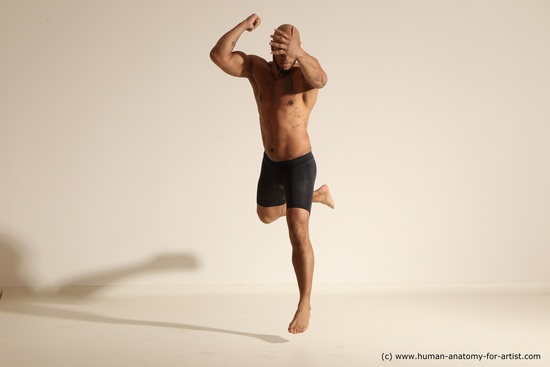 Underwear Gymnastic poses Man Black Muscular Bald Dancing Dynamic poses Academic