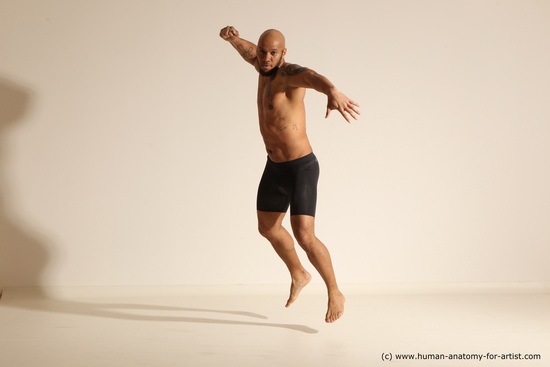 Underwear Gymnastic poses Man Black Muscular Bald Dancing Dynamic poses Academic