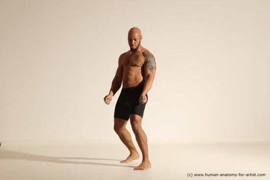 Underwear Gymnastic poses Man Black Muscular Bald Dancing Dynamic poses Academic