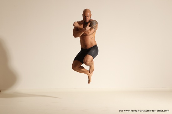 Underwear Gymnastic poses Man Black Muscular Bald Dancing Dynamic poses Academic